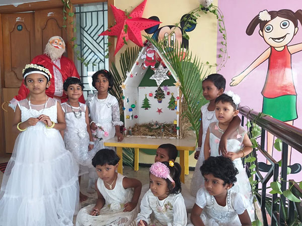 The children were told about the birth of Lord Jesus and the legend of Santa Claus. The spirit of giving and sharing was inculcated among the tiny tots as they exchanged exquisitely packed gifts with each other and played games. |Christmas celebrations - Thudiyalur